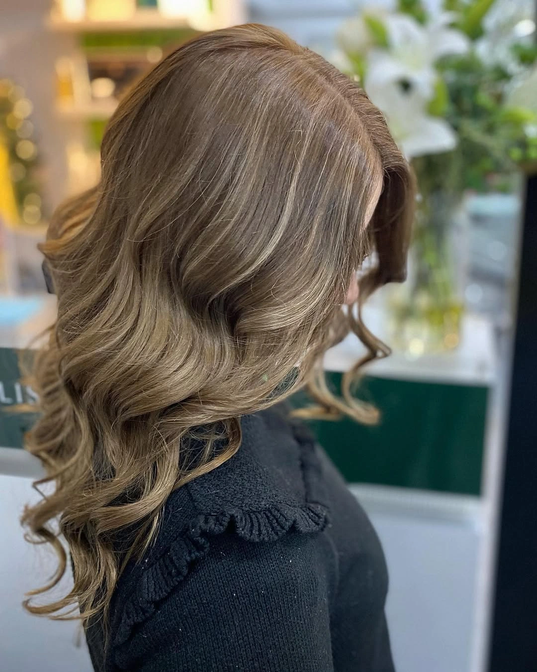 Medium layered neutral mushroom brown blonde curls