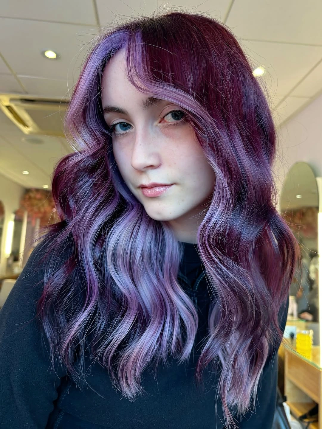 Long burgundy purple waves with lavender face framing pieces