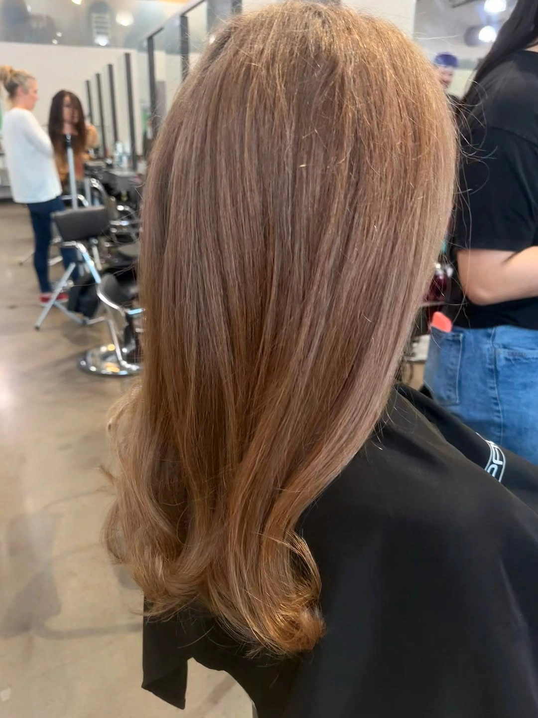 Smooth warm brown medium length hair with inward ends