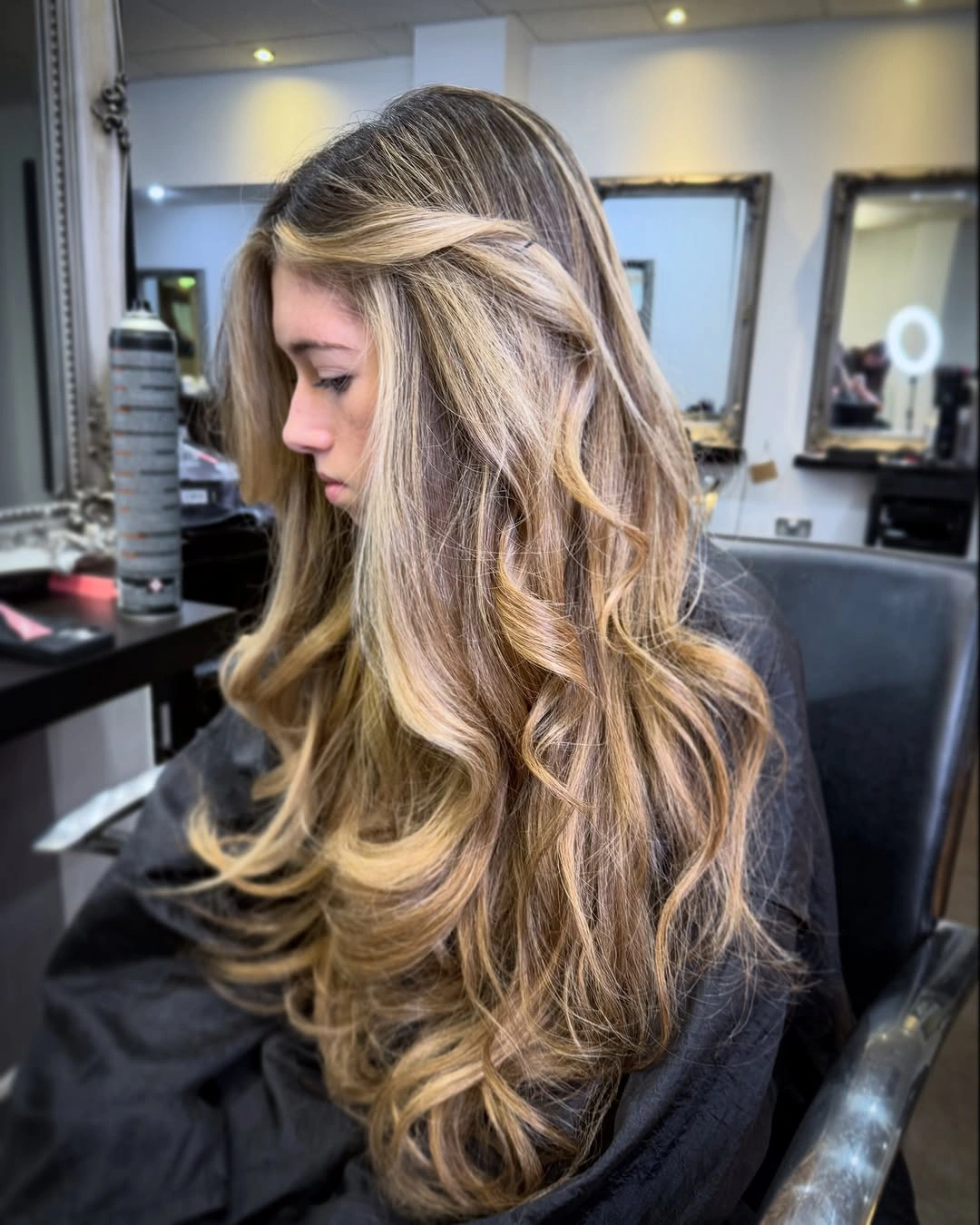 Long blonde brown waves with bright face framing pieces