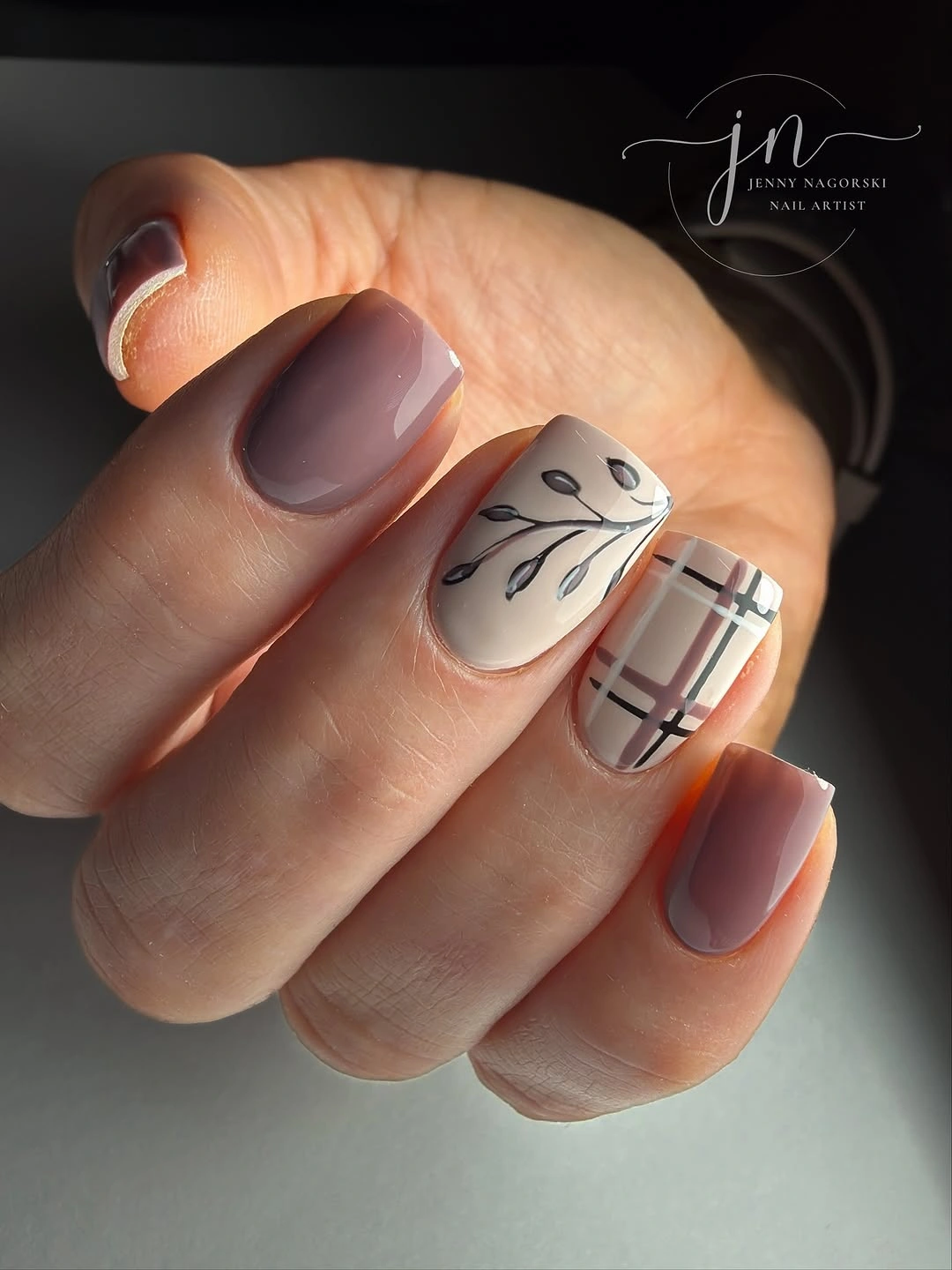 Mauve rounded nails with cream plaid and branch accents