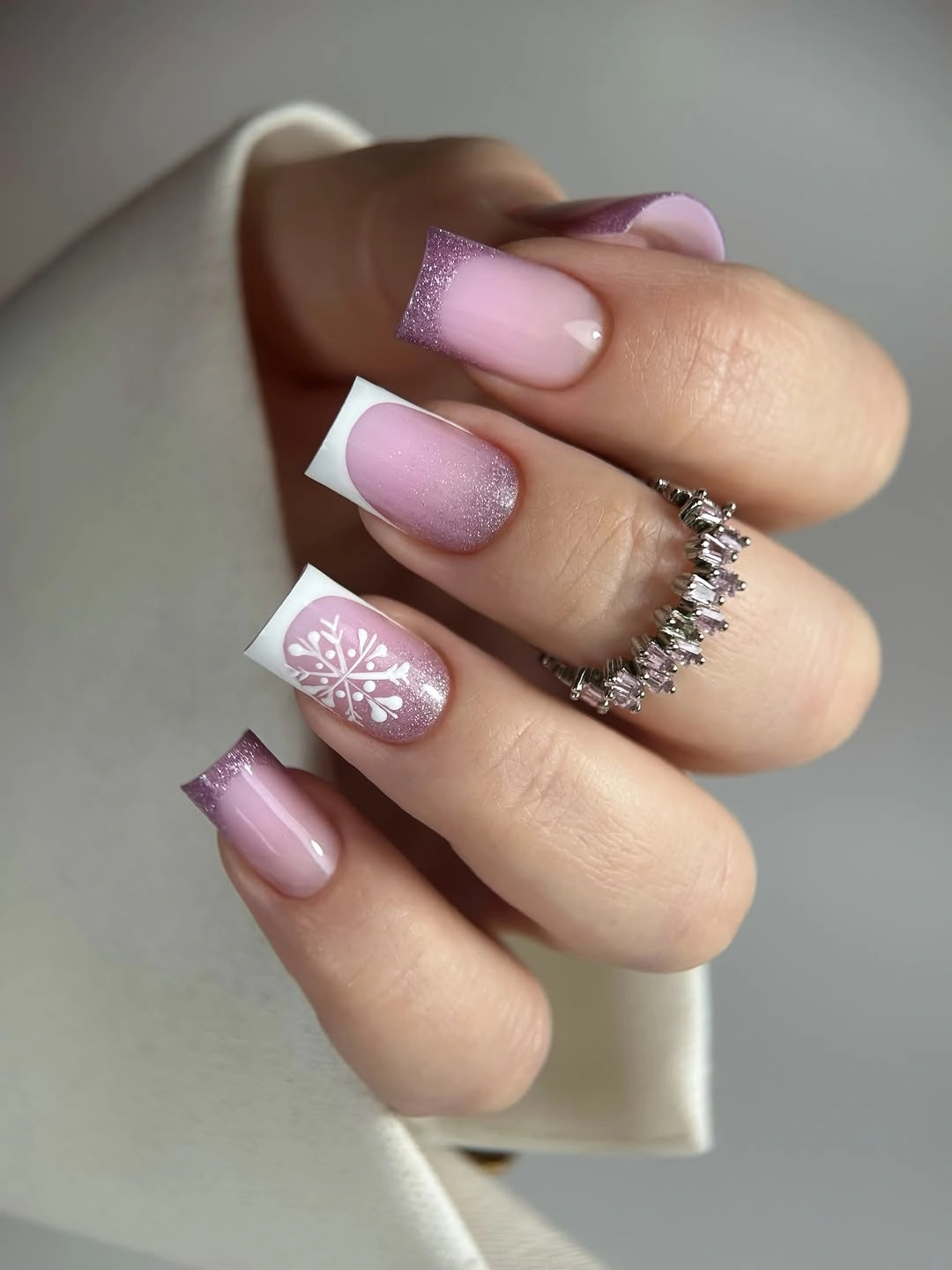 Long square pink nails with white tips and snowflake