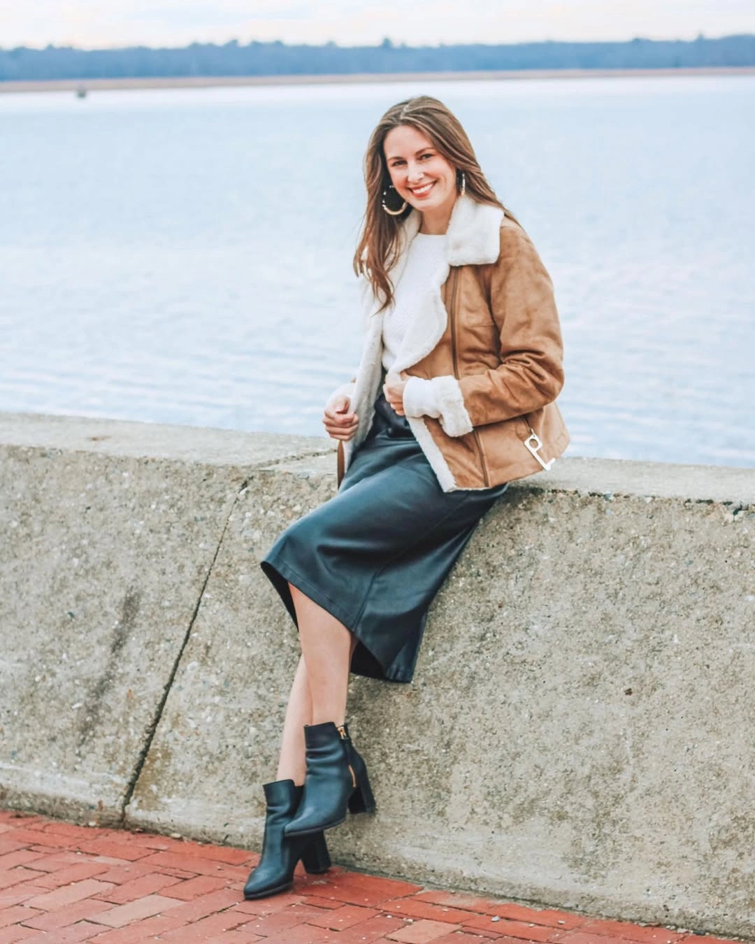 Camel jacket, white top, teal midi skirt and black ankle boots