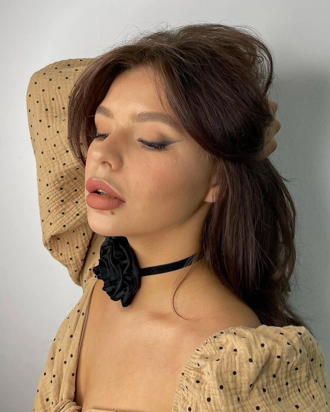 Loose brunette hair with lifted crown and swept front