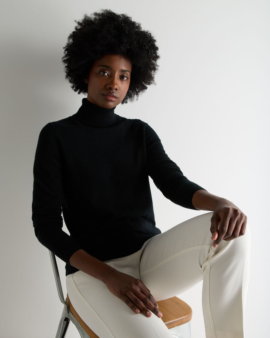 Fitted Black Turtleneck Sweater with Cream Pants — Aesthetic Black Sweater Outfit