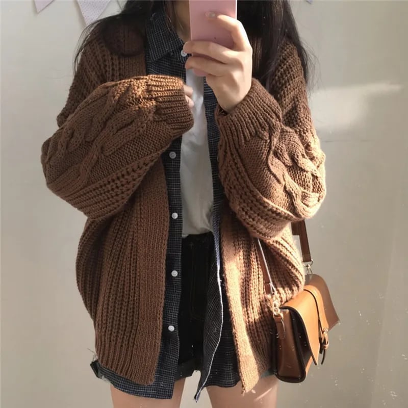 Chunky Brown Cable Knit Cardigan Over Plaid and T-Shirt Chunky Brown Cable Knit Cardigan Over Plaid and T-Shirt — Aesthetic Brown Cardigan Outfit