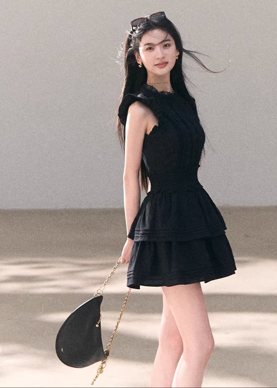 Black Tiered Mini Dress with Ruffled Neckline and Gold Chain Handbag Black Tiered Mini Dress with Ruffled Neckline and Gold Chain Handbag — Aesthetic Feminine Outfits