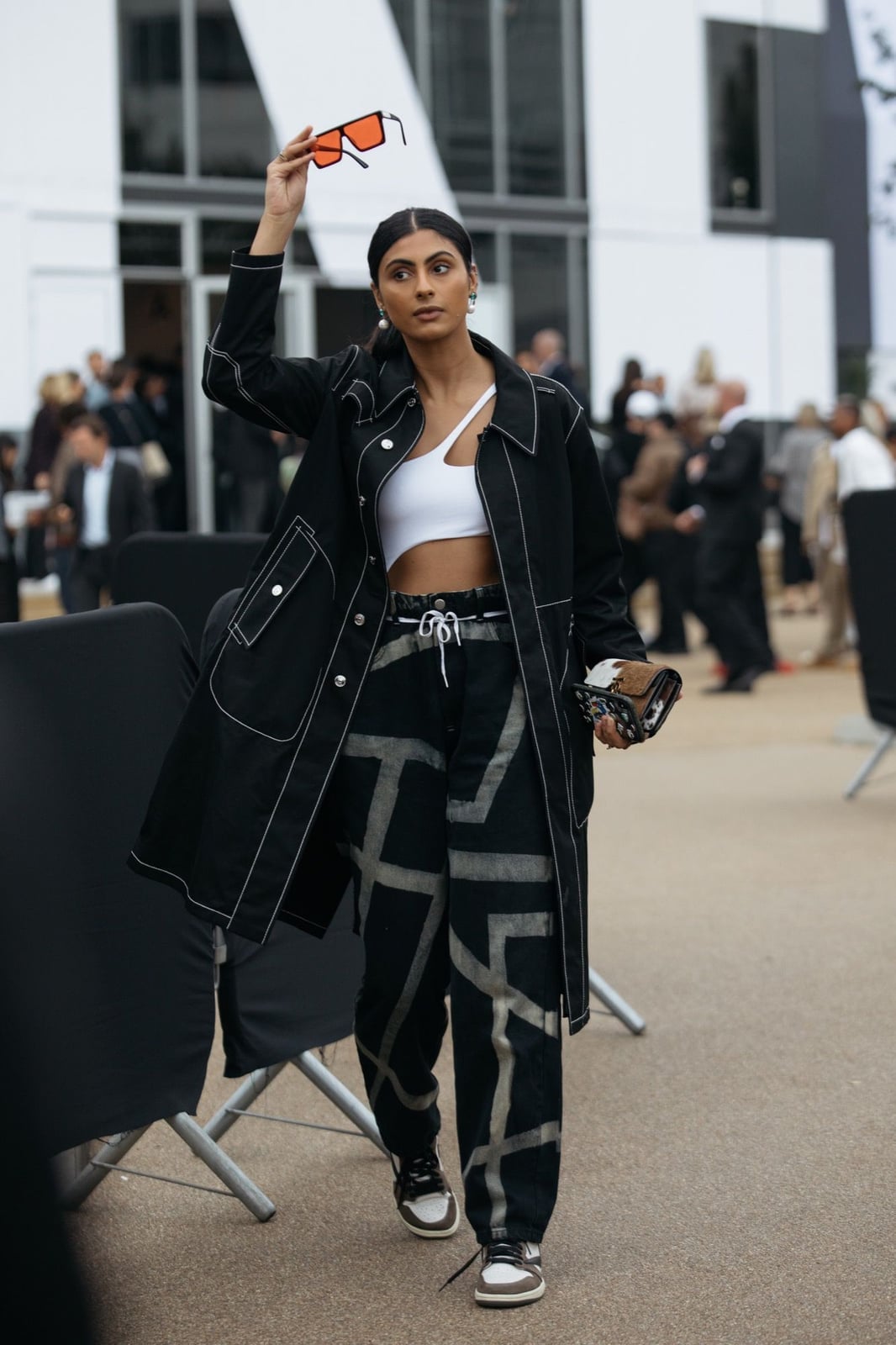 Black Trench Coat Over White Crop Top and Geometric Print Pants Black Trench Coat Over White Crop Top and Geometric Print Pants — Aesthetic Feminine Outfits