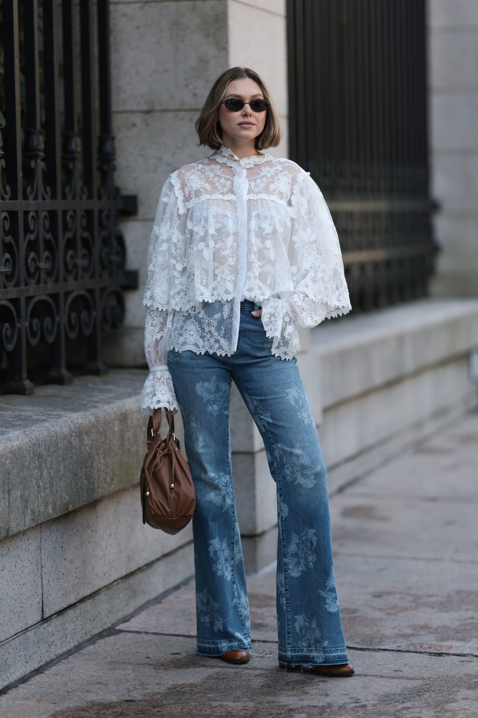 Oversized White Lace Blouse With Wide-Leg Jeans and Brown Heeled Boots Oversized White Lace Blouse With Wide-Leg Jeans and Brown Heeled Boots — Aesthetic Lace Top Outfit
