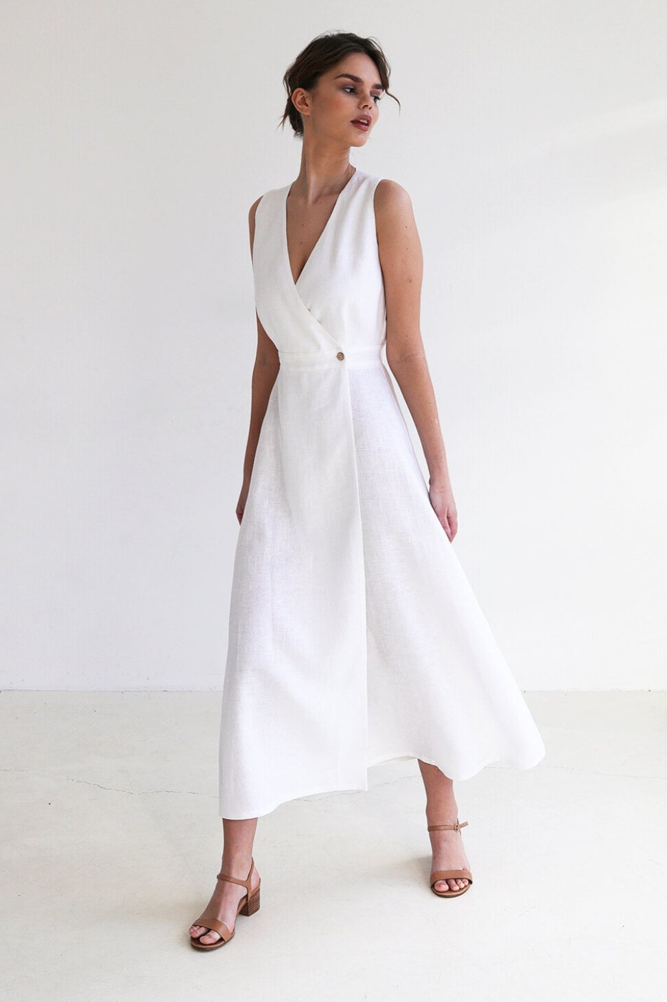 White Linen Midi Wrap Dress with Gold Button Detail White Linen Midi Wrap Dress with Gold Button Detail — Aesthetic Linen Dress