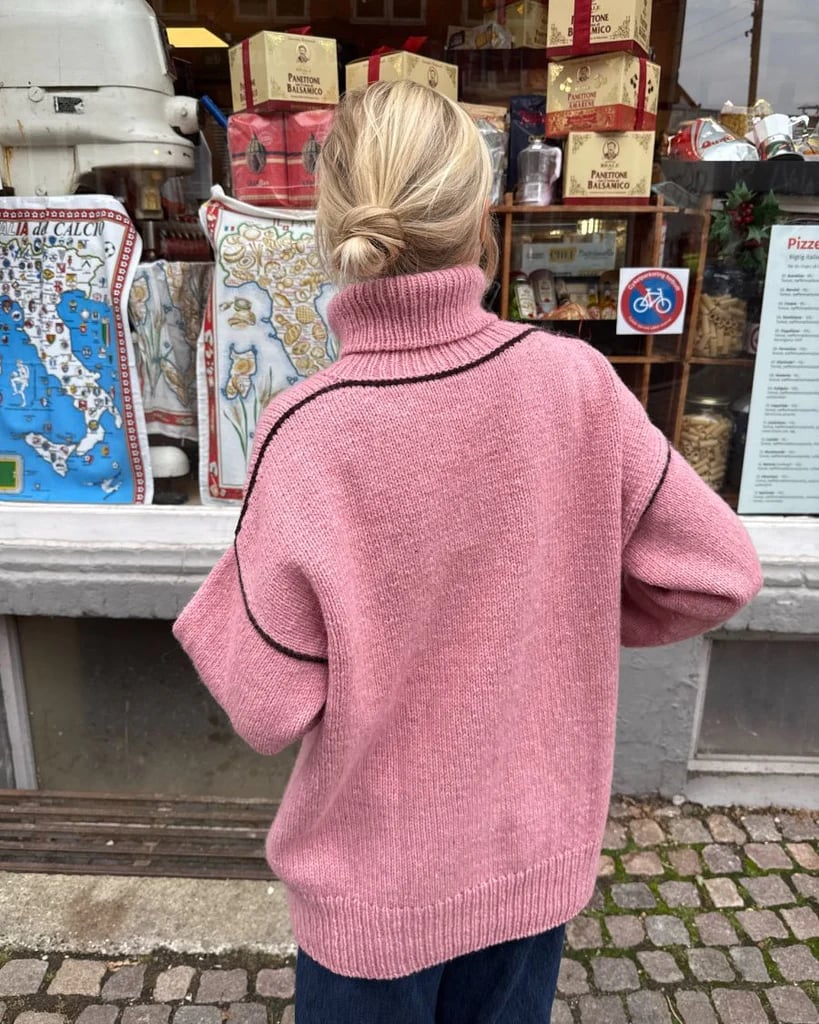 Pink Oversized Knit Sweater with Black Trim and Blue Jeans — Aesthetic Pink Sweater Outfit