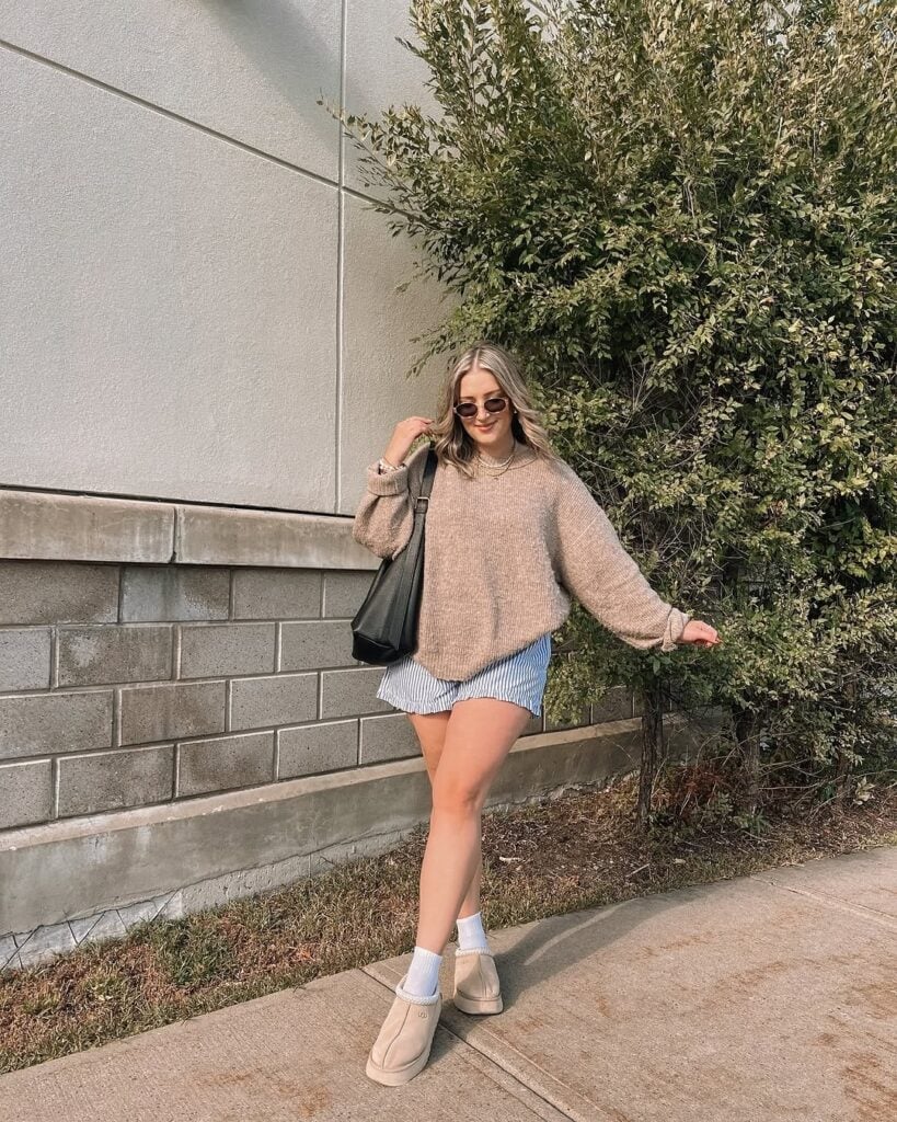 Oversized Sweater With Ugg Clogs And Striped Shorts Oversized Sweater With Ugg Clogs And Striped Shorts — Aesthetic Ugg Tasman Outfit