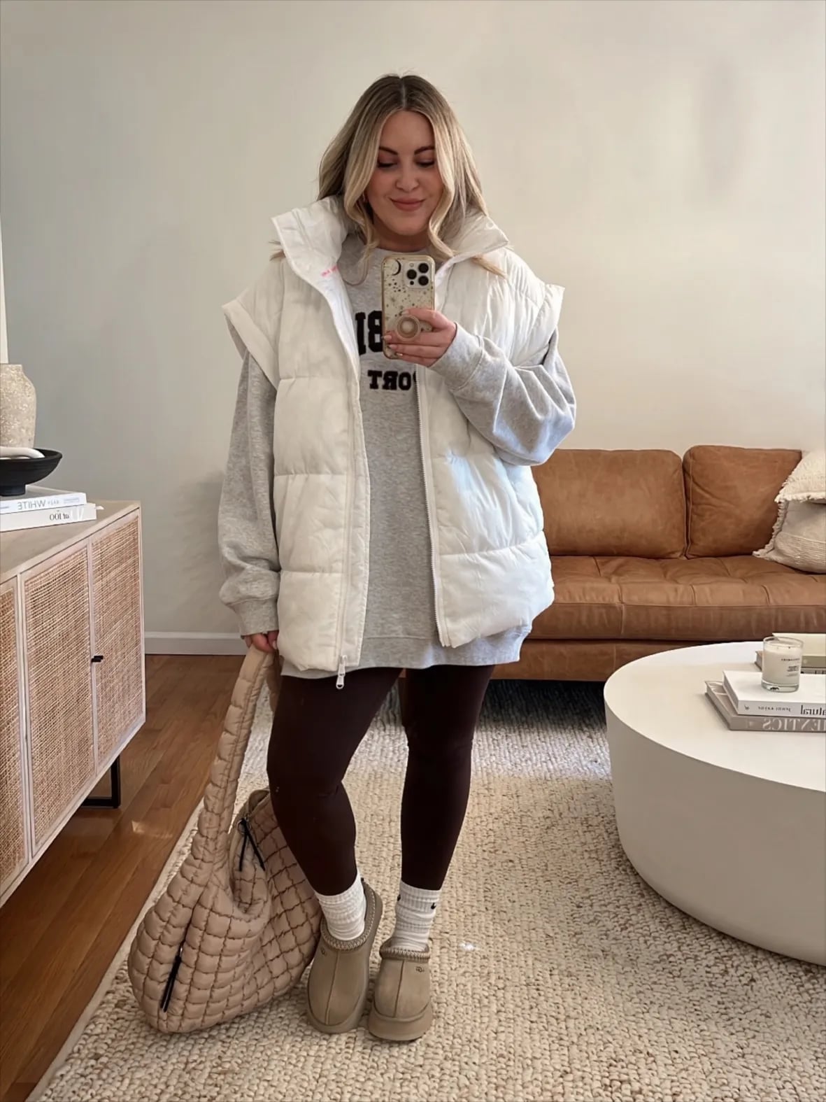 Puffer Vest With Ugg Tasman Clogs And Sweatshirt Puffer Vest With Ugg Tasman Clogs And Sweatshirt — Aesthetic Ugg Tasman Outfit