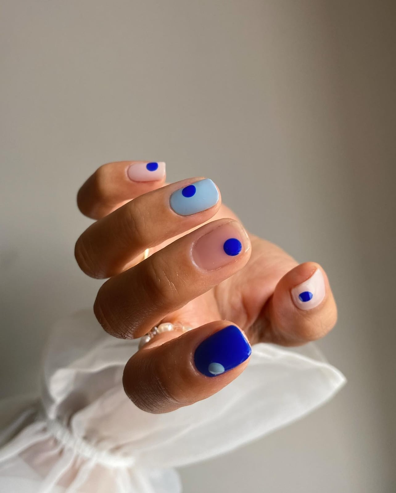 Light Pink and Blue Dot Squoval Nails Light Pink and Blue Dot Squoval Nails — Aesthetic University Nails