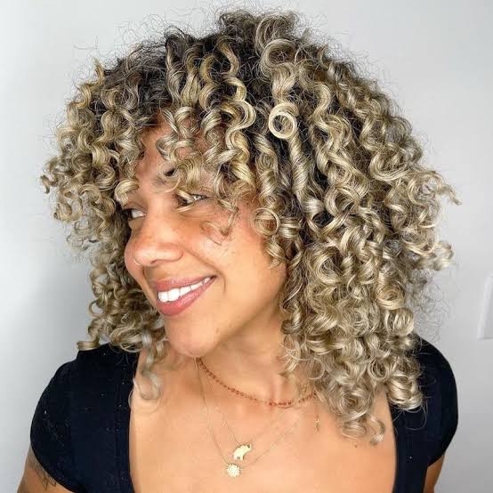 Shoulder Length Thick Curls With Dirty Blonde Highlights — Blonde Highlights Hair Inspiration