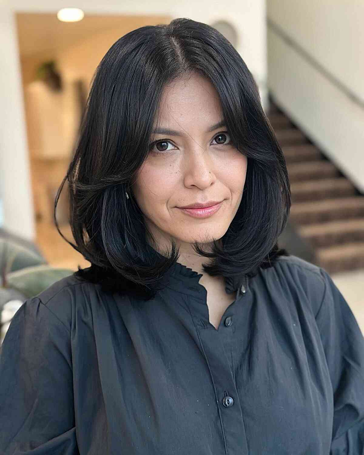 Chin Length Black Bob Blowout With Volume Chin Length Black Bob Blowout With Volume — Classy 90s Blowout Hair
