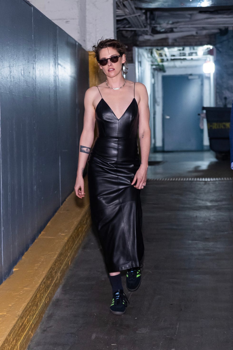 Black Leather Slip Dress with Black Adidas Sneakers, Close-Up Take — Classy Adidas Samba Outfits