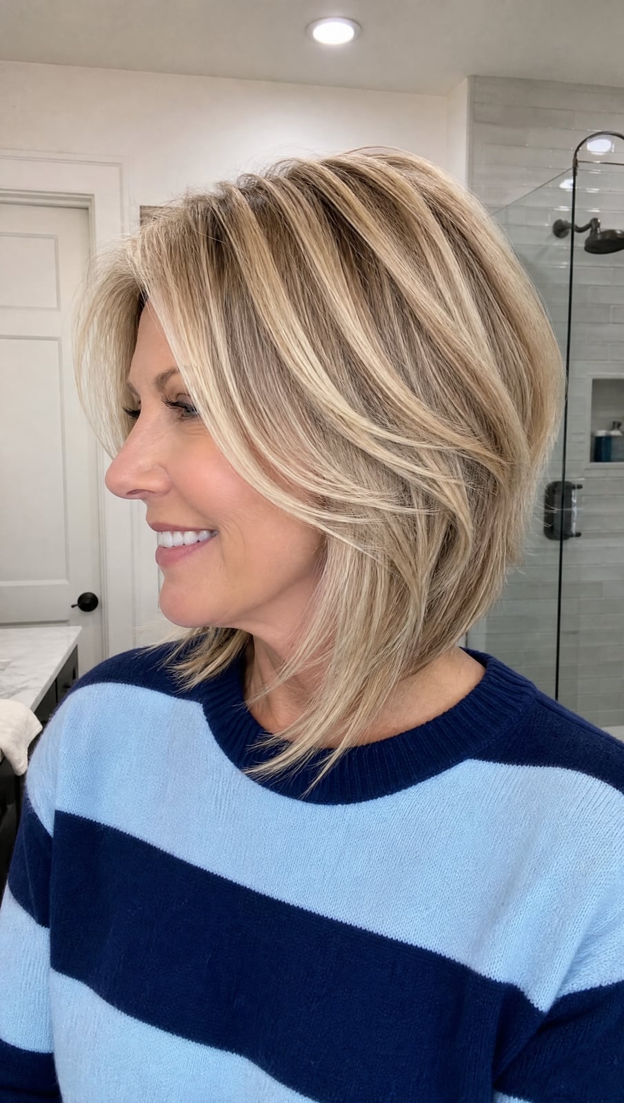 Blonde Layered Bob With Textured Side-Swept Bangs Blonde Layered Bob With Textured Side-Swept Bangs — Classy Asymmetrical Bob