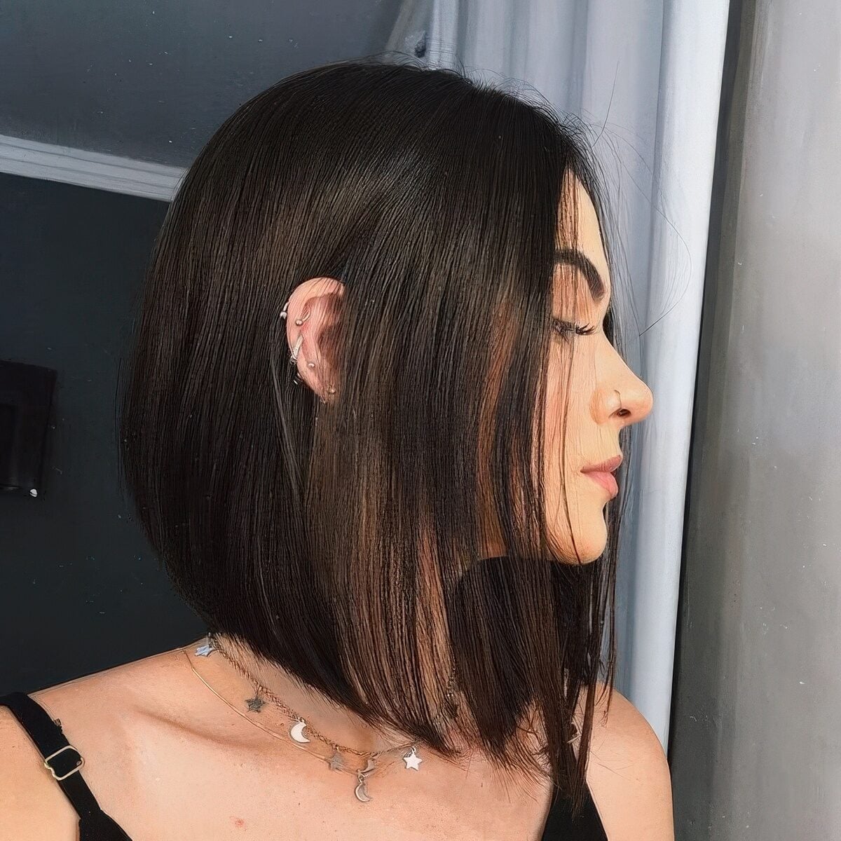 Wavy Dark Brown Bob With Textured Ends Wavy Dark Brown Bob With Textured Ends — Classy Asymmetrical Bob
