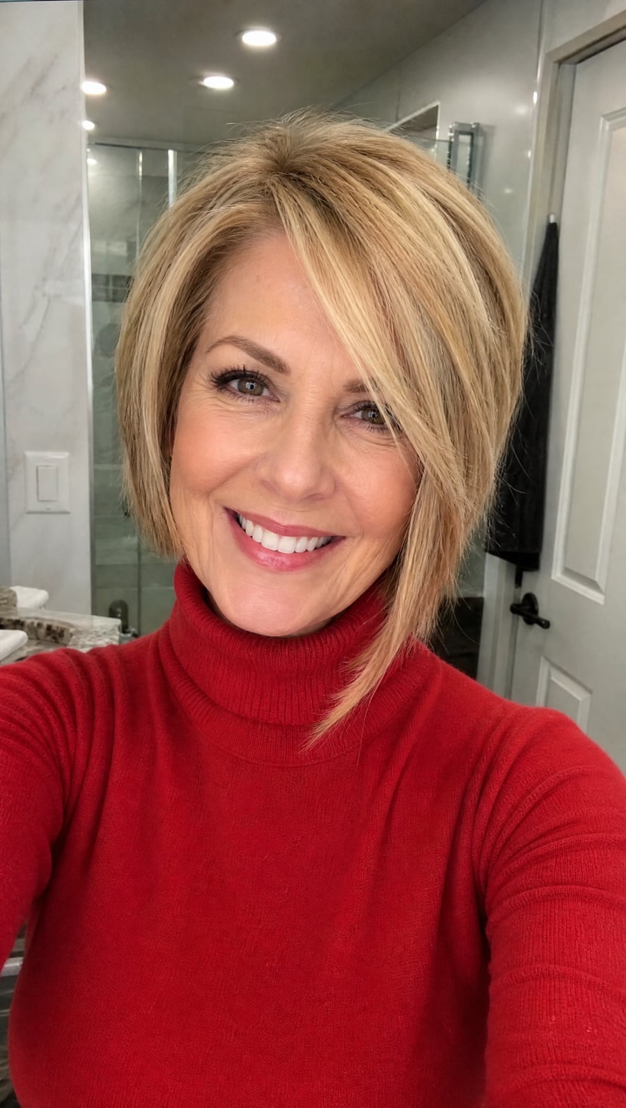 Blonde Layered Bob With Smooth Blowout Blonde Layered Bob With Smooth Blowout — Classy Asymmetrical Bob