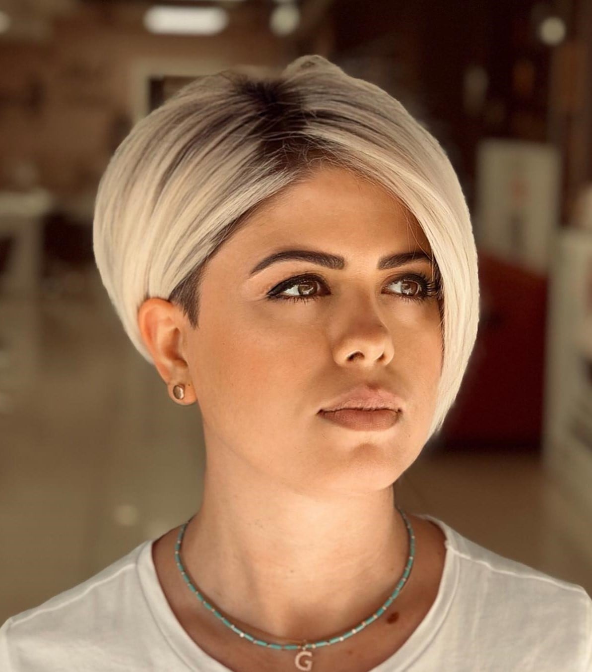 Platinum Blonde Asymmetrical Pixie With Dark Roots Platinum Blonde Asymmetrical Pixie With Dark Roots — Classy Asymmetrical Pixie