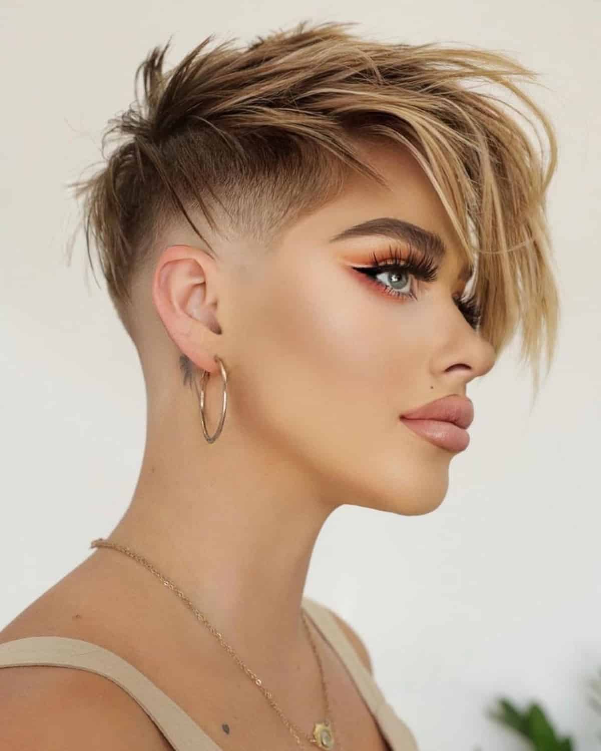 Undercut Asymmetrical Pixie With Long Bangs Undercut Asymmetrical Pixie With Long Bangs — Classy Asymmetrical Pixie