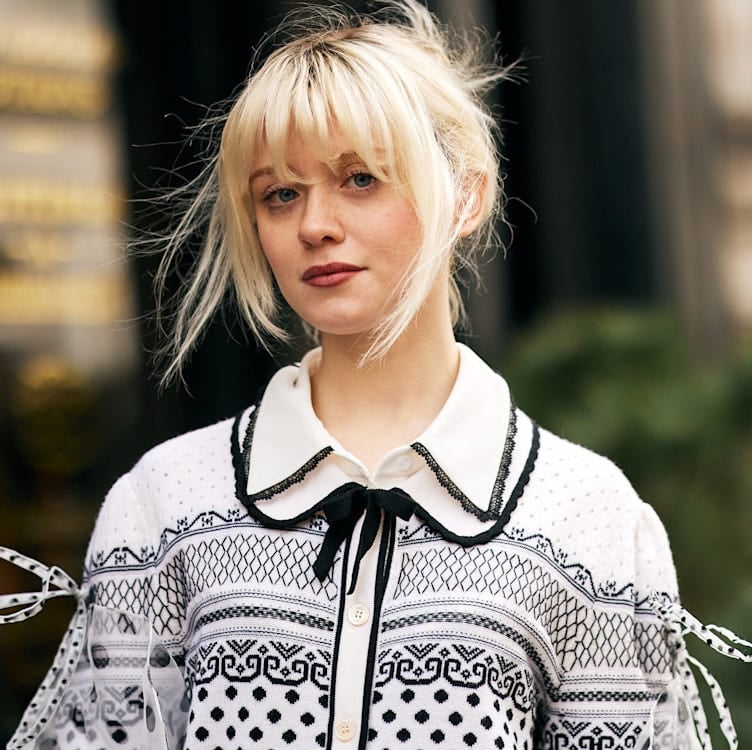 Platinum Collarbone Shag With Wispy Bangs Platinum Collarbone Shag With Wispy Bangs — Classy Bangs for Round Face