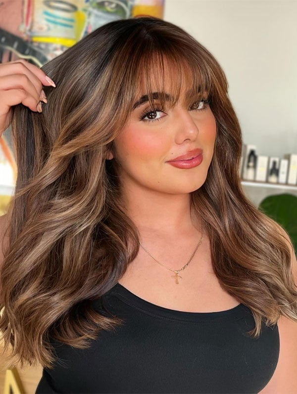 Mid-Back Layers With Side Part And Face-Framing Bangs Mid-Back Layers With Side Part And Face-Framing Bangs — Classy Bangs for Round Face