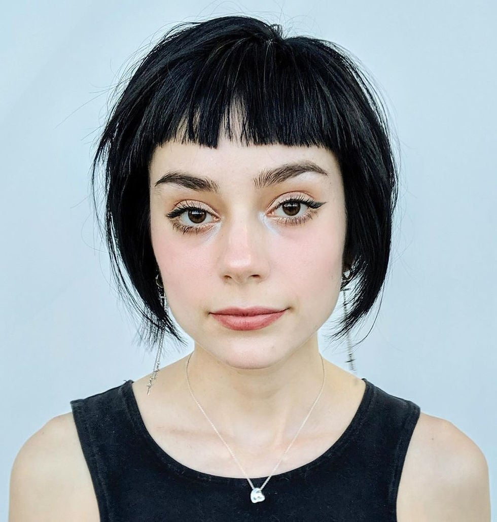 Ear Length Black Blunt Bob With Blunt Bangs Ear Length Black Blunt Bob With Blunt Bangs — Classy Bangs for Round Face
