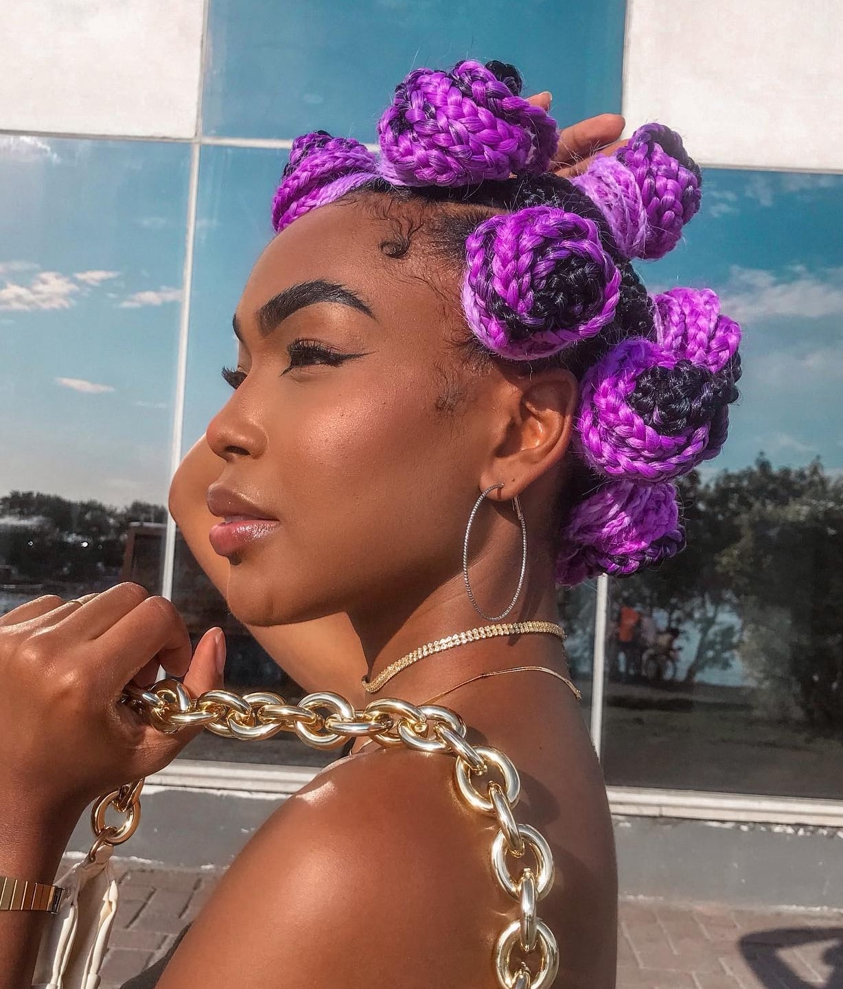 Vibrant Purple and Black Bantu Knots with Gold Jewelry, Close-Up Take Vibrant Purple and Black Bantu Knots with Gold Jewelry, Close-Up Take — Classy Bantu Knots