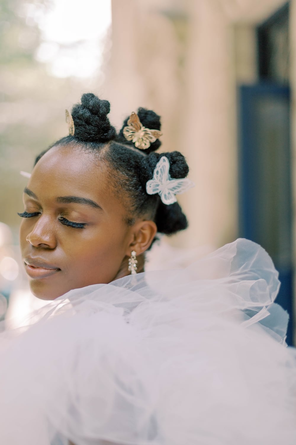 Bantu Knots with Butterfly Accessories for Bridal Bantu Knots with Butterfly Accessories for Bridal — Classy Bantu Knots