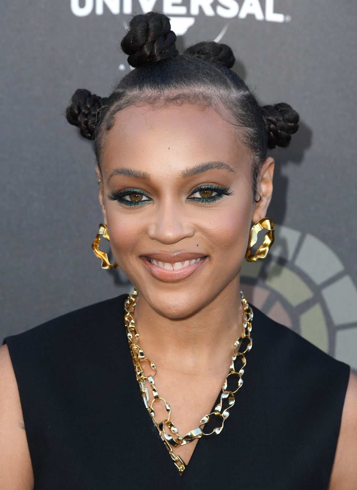 Geometric Bantu Knots with Sculptural Gold Earrings, Softer Variation Geometric Bantu Knots with Sculptural Gold Earrings, Softer Variation — Classy Bantu Knots