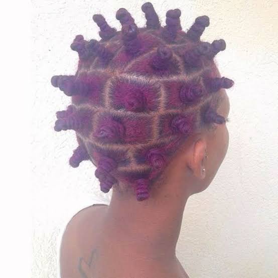 Vibrant Purple Bantu Knots in a Geometric Pattern Vibrant Purple Bantu Knots in a Geometric Pattern — Classy Bantu Knots
