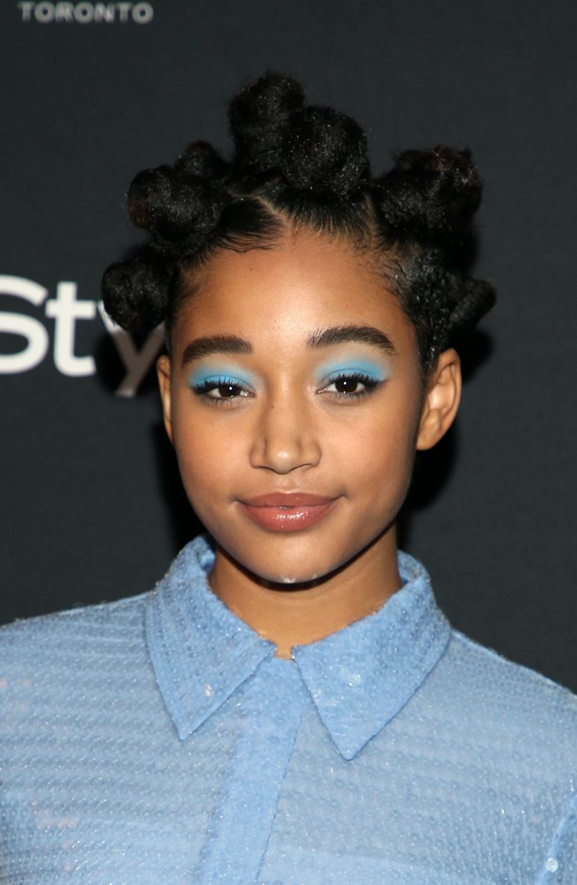 Bantu Knots with Blue Eyeshadow and a Light Blue Shirt Bantu Knots with Blue Eyeshadow and a Light Blue Shirt — Classy Bantu Knots