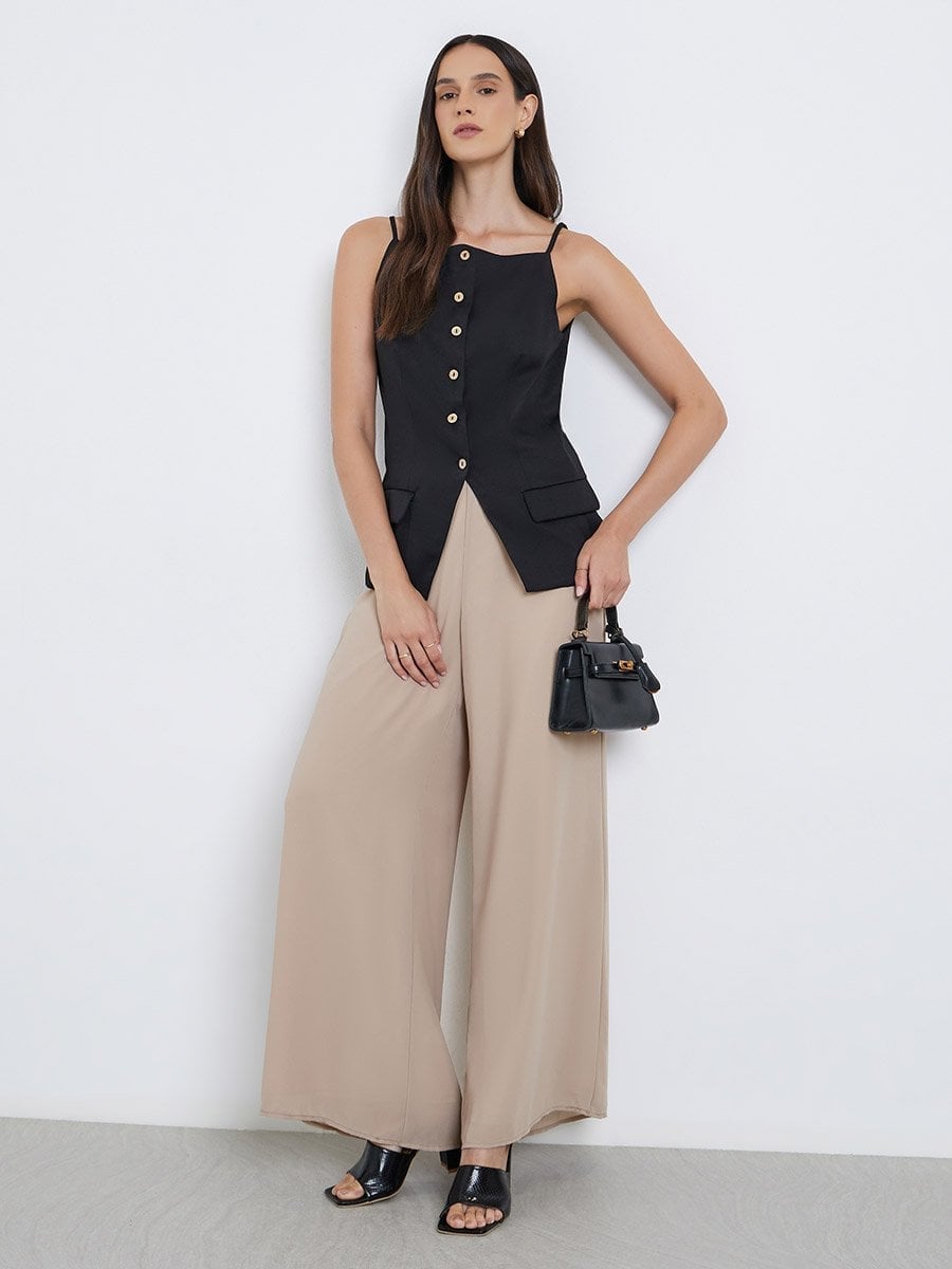 Beige Wide Leg Trousers With Black Sleeveless Top, Close-Up Take Beige Wide Leg Trousers With Black Sleeveless Top, Close-Up Take — Classy Beige Pants Outfits