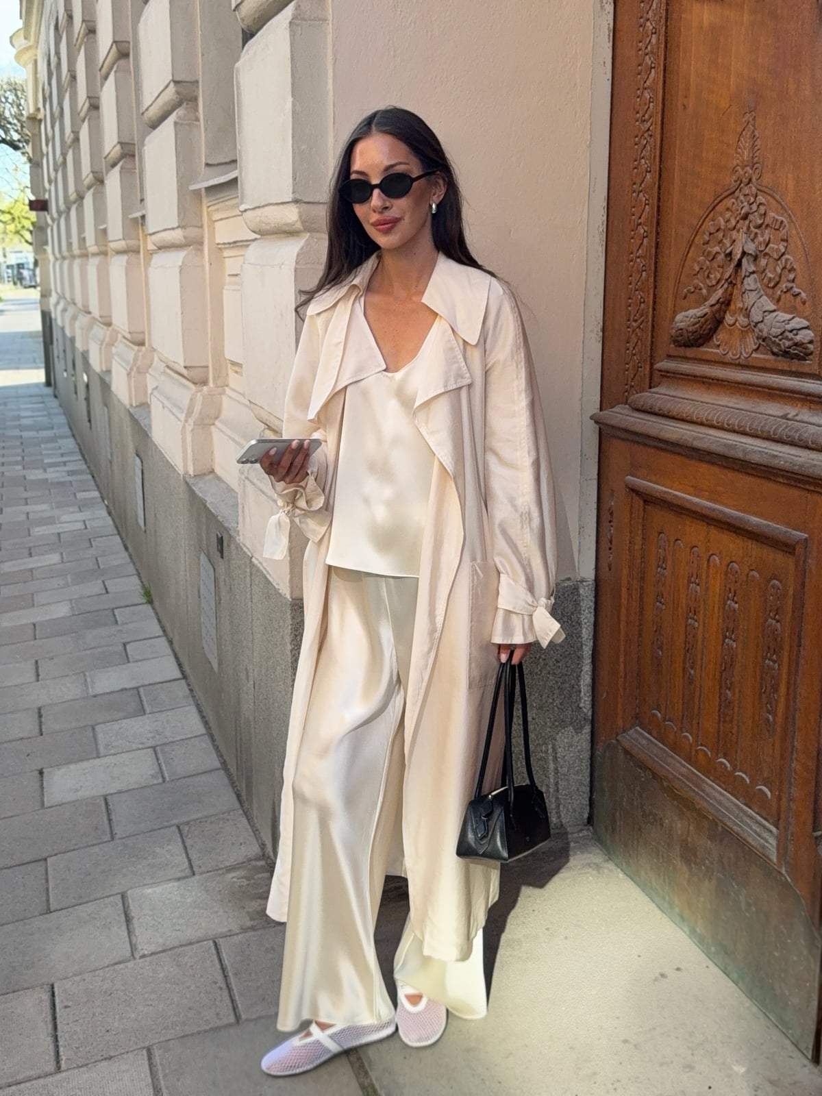 Cream Silk Trousers With Matching Trench Coat and Pink Mesh Sneakers Cream Silk Trousers With Matching Trench Coat and Pink Mesh Sneakers — Classy Beige Pants Outfits