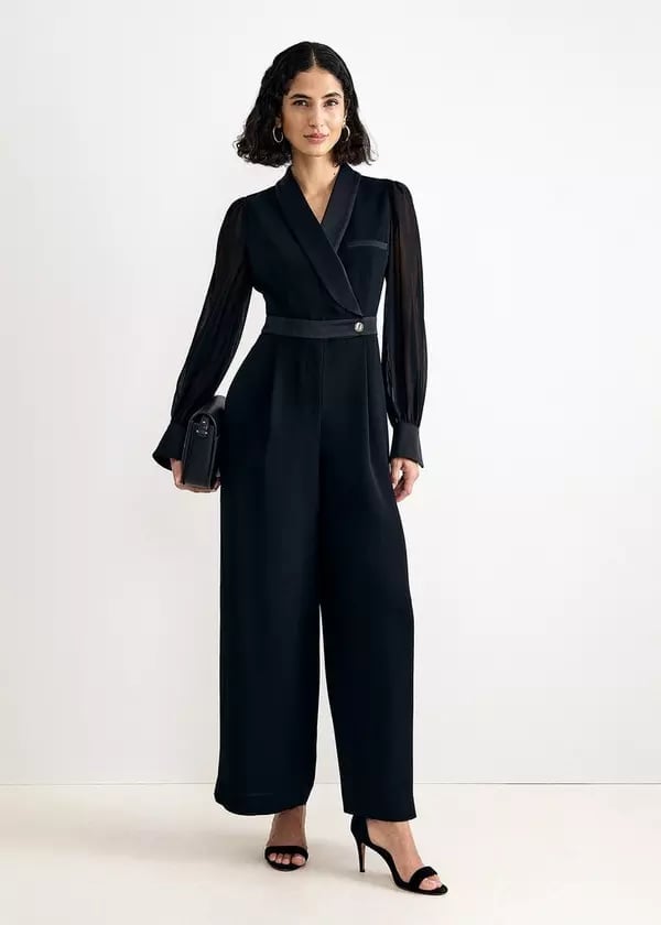 Monochromatic Black Jumpsuit with Tuxedo Lapels Monochromatic Black Jumpsuit with Tuxedo Lapels — Classy Black Jumpsuit Outfit