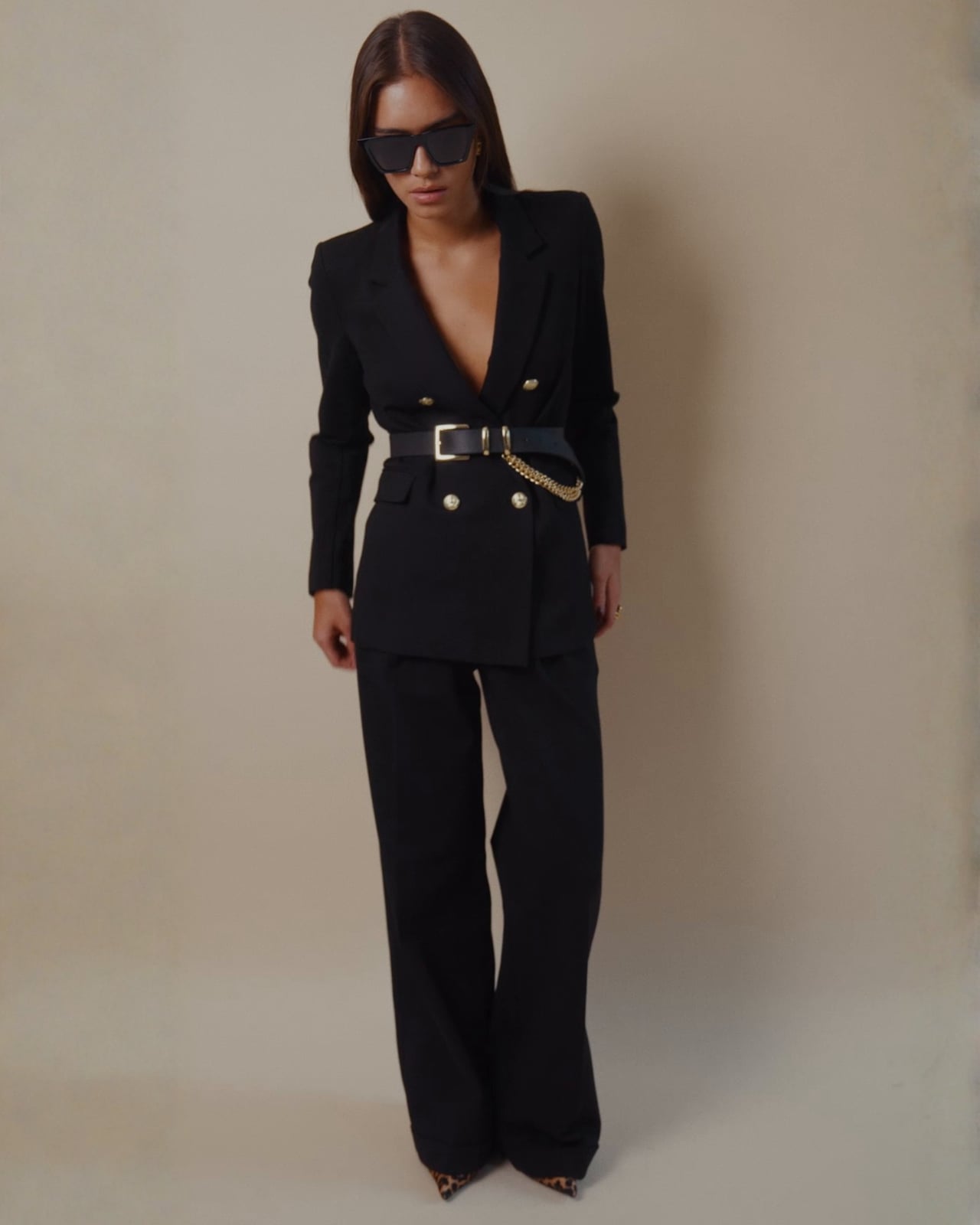 Monochromatic Black Wide-Leg Trousers with a Blazer and Chain Belt — Classy Black Pants Outfits