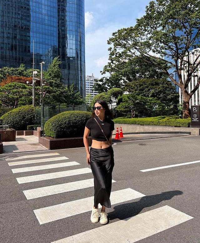 Black Satin Midi Skirt with Black Crop Top and White Sneakers Black Satin Midi Skirt with Black Crop Top and White Sneakers — Classy Black Satin Skirt Outfit