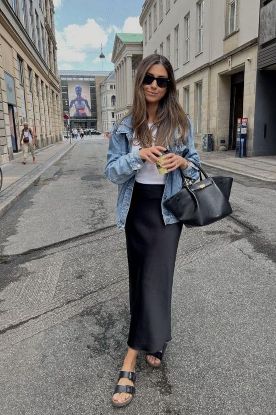 Black Satin Maxi Skirt With T-Shirt and Denim Jacket Black Satin Maxi Skirt With T-Shirt and Denim Jacket — Classy Black Skirt Outfit