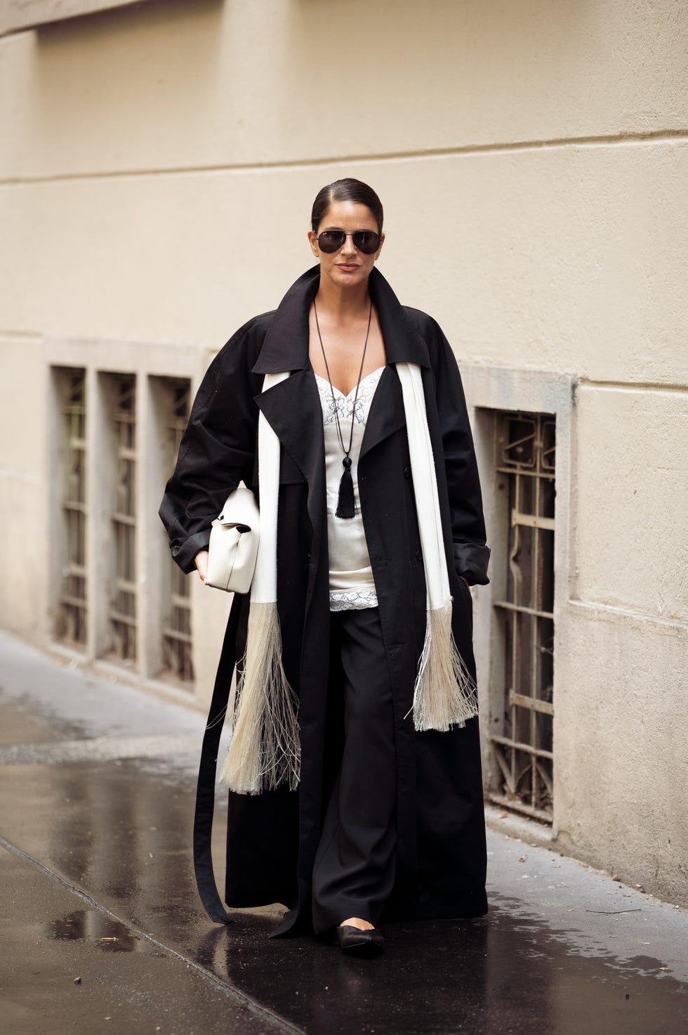 Oversized Black Trench Coat With White Accents Oversized Black Trench Coat With White Accents — Classy Black Trench Coat Outfit