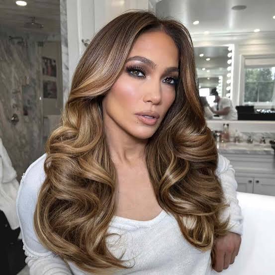 Mid-Back Curls With Voluminous Golden Blonde Highlights Mid-Back Curls With Voluminous Golden Blonde Highlights — Classy Blonde Highlights on Dark Hair