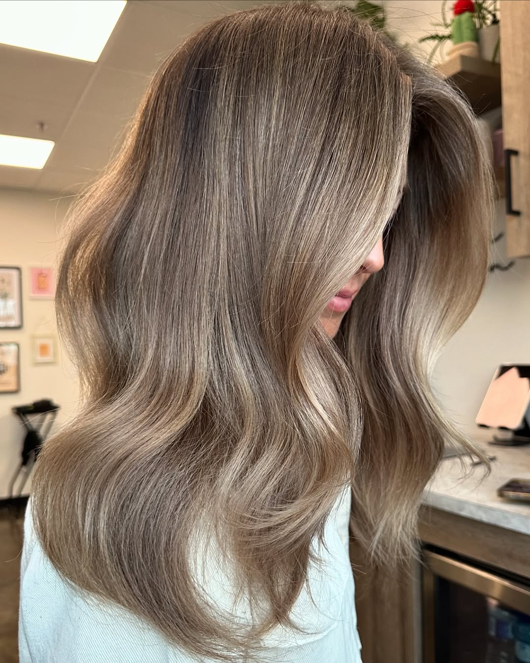Mid-Back Wavy Layers With Dimensional Blonde Highlights Mid-Back Wavy Layers With Dimensional Blonde Highlights — Classy Blonde Highlights on Dark Hair