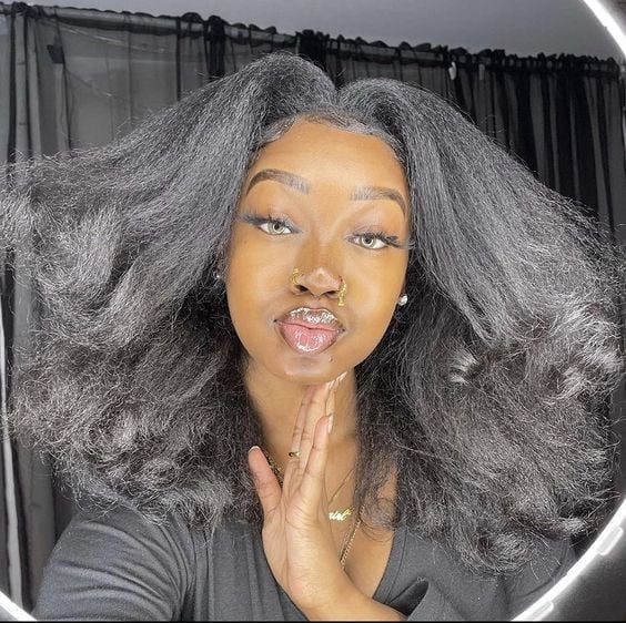 Mid-Back Wavy Blowout With Curtain Bangs Mid-Back Wavy Blowout With Curtain Bangs — Classy Blowout Hairstyles Black Women