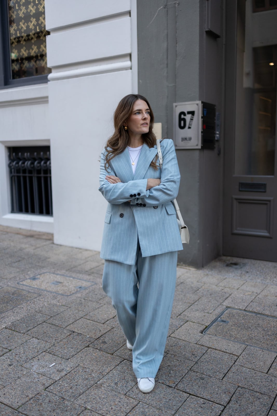 Light Blue Pinstripe Wide-Leg Suit Trousers with a White T-Shirt — Classy Blue Pants Outfits