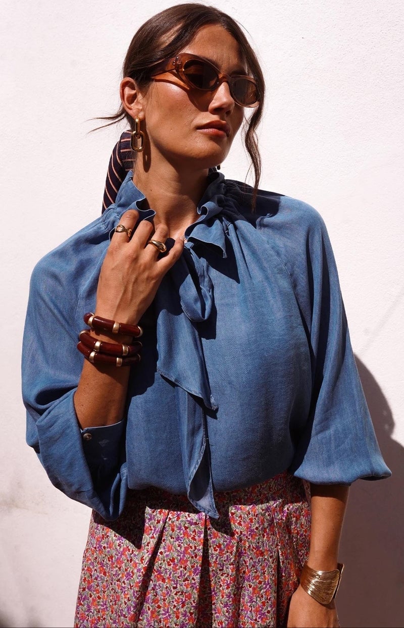 Blue Denim Pussy-Bow Blouse with Floral Skirt Blue Denim Pussy-Bow Blouse with Floral Skirt — Classy Blue Top Outfits