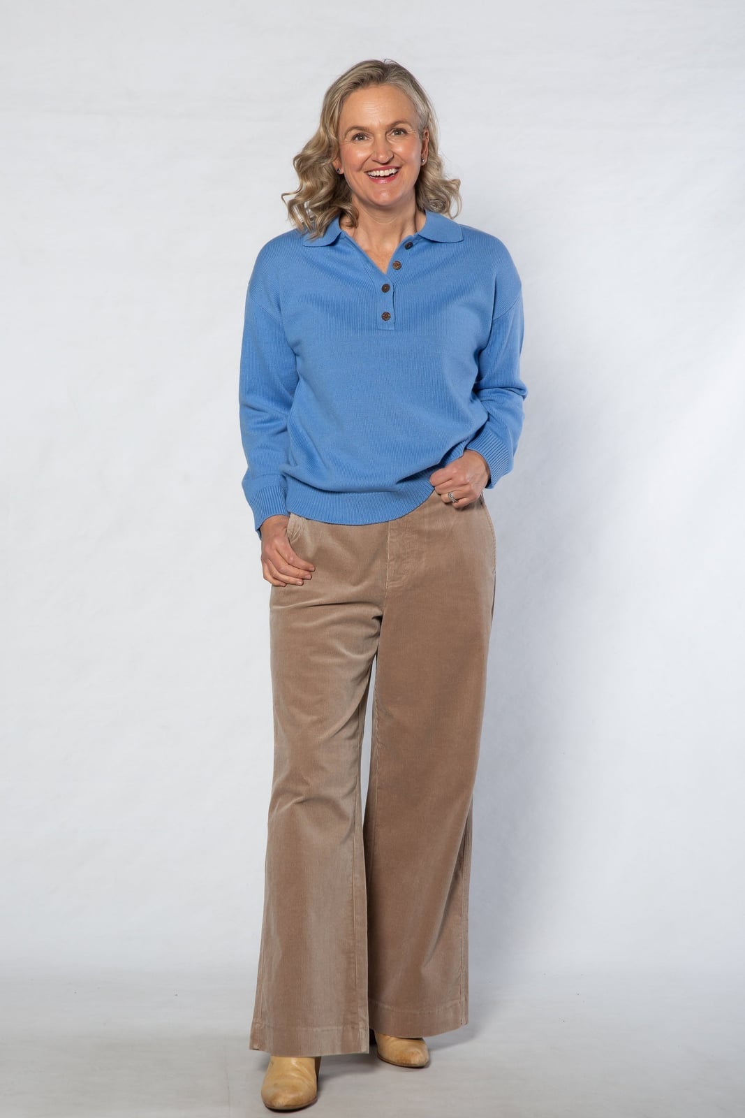 Blue Knit Sweater with Collar and Tan Trousers Blue Knit Sweater with Collar and Tan Trousers — Classy Blue Top Outfits