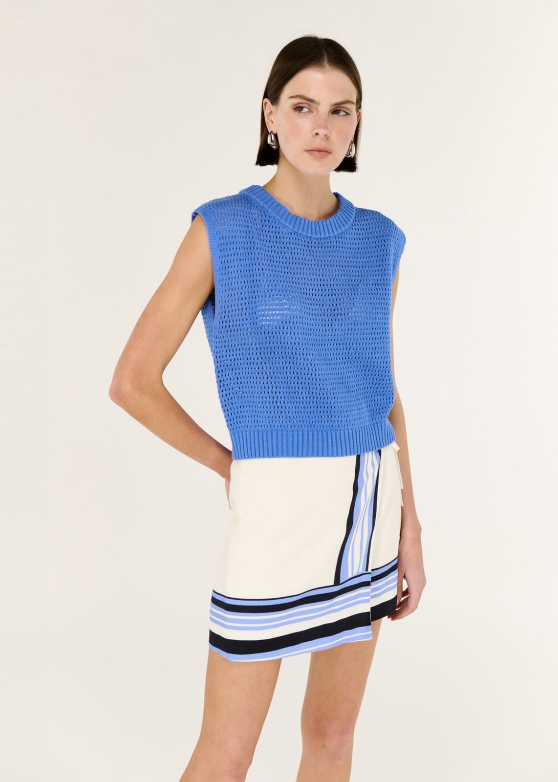 Cobalt Blue Sleeveless Knit Top with Striped Mini Skirt Cobalt Blue Sleeveless Knit Top with Striped Mini Skirt — Classy Blue Top Outfits