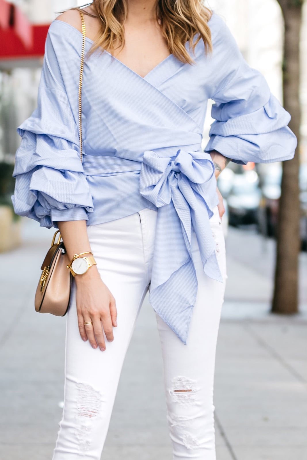 Light Blue Wrap Blouse with Ruffle Sleeves and Bow Tie and Nude Heels Light Blue Wrap Blouse with Ruffle Sleeves and Bow Tie and Nude Heels — Classy Blue Top Outfits
