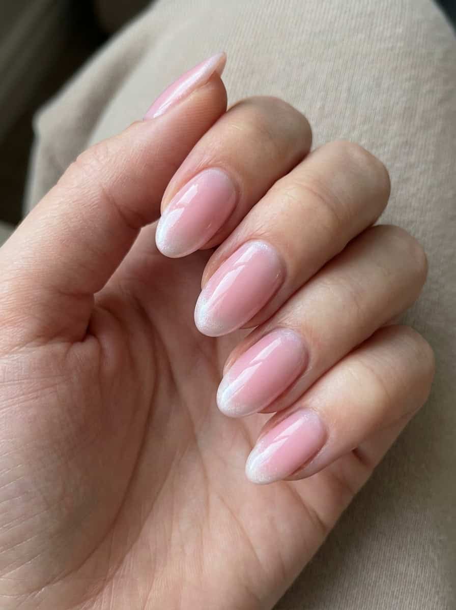 Sheer Pink Base with Shimmer French Tips Medium Oval Nails Sheer Pink Base with Shimmer French Tips Medium Oval Nails — Classy Blush Nails